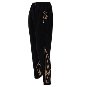 Black colored track pant for women featuring an elastic ankles and waist with adjustable drawstrings and front pockets with the logo right above the left pocket and geometric designs at the back of the track pant on the lower leg.